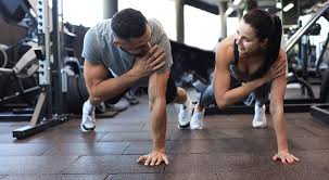 Toning Bingo Wings: Your Ultimate Guide to Sculpting Sleek Arms at the Gym 3 Fitness trainer demonstrating arm toning exercises Stourbridge