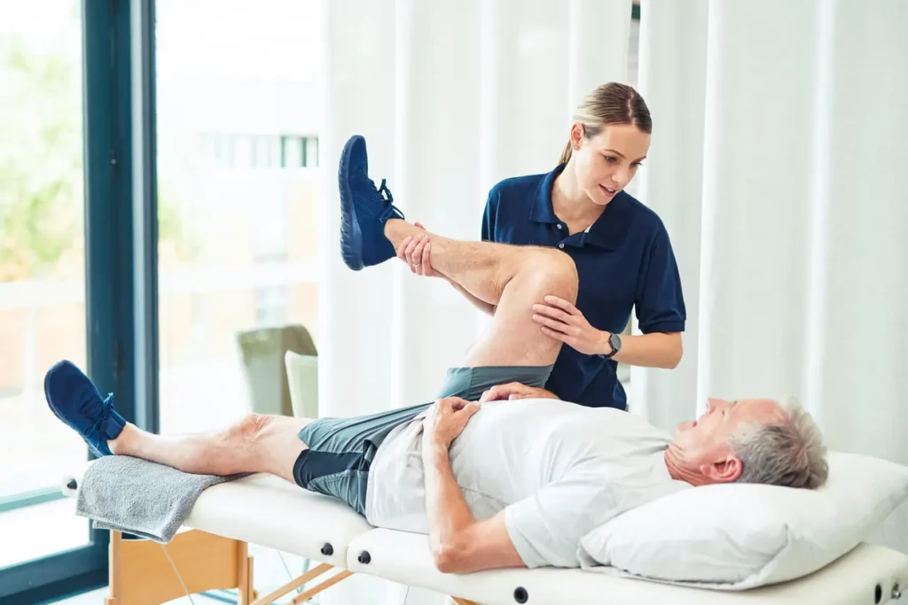 Revitalising Recovery: Effective Rehabilitation Strategies for Muscle Injuries 3 Physiotherapist assisting a patient with muscle recovery exercises Stourbridge